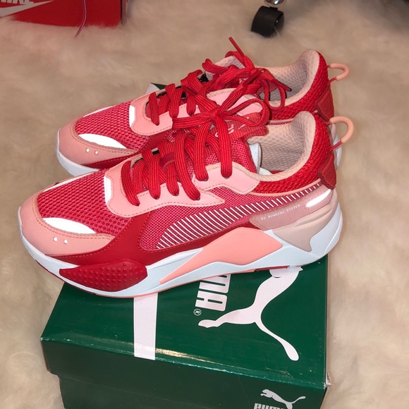 red and pink pumas